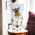 DERUTA ORNATO: Tall flared vase decorated in a colorful Ricco Deruta scrollwork