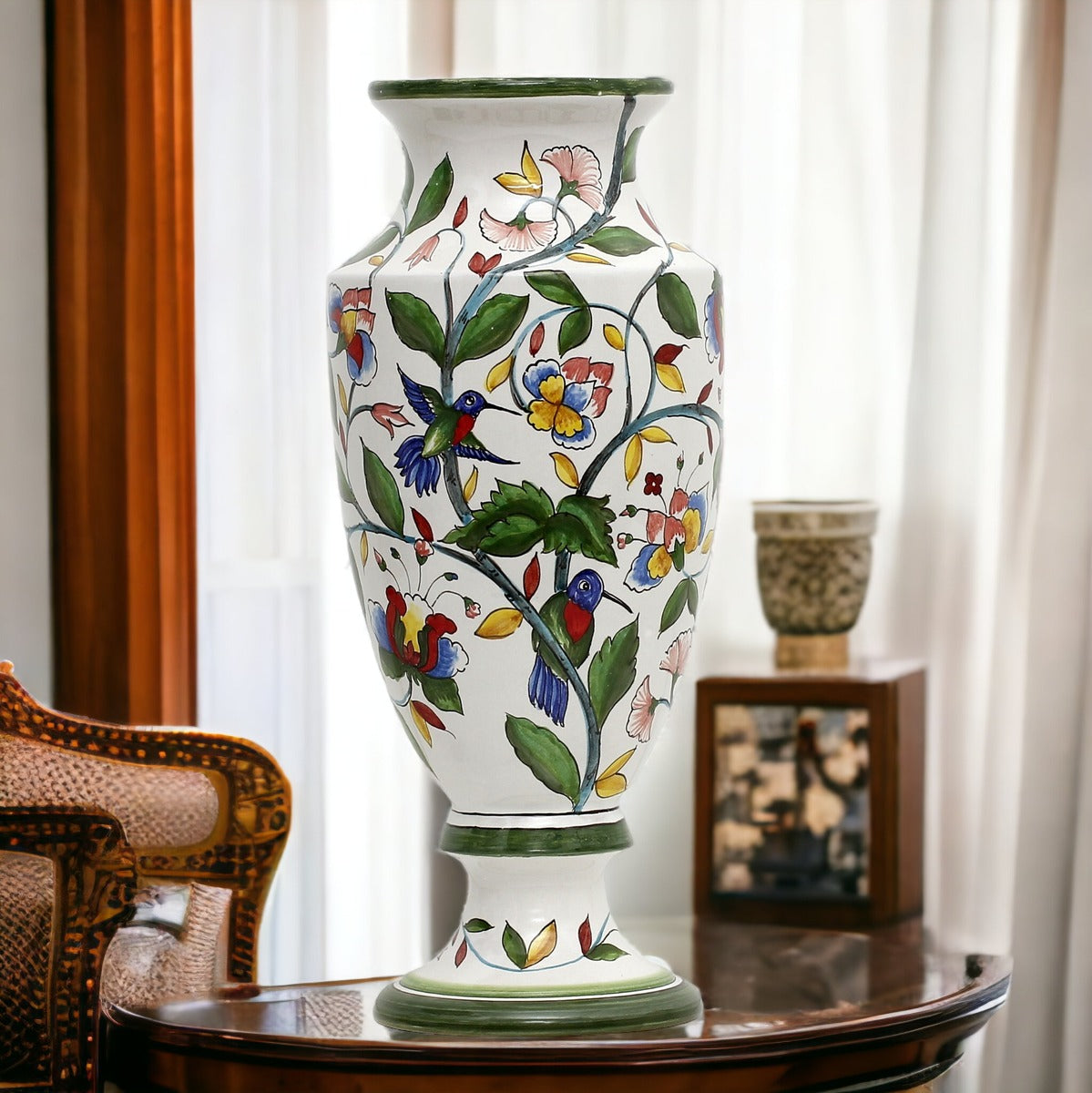 DERUTA FLORIANA: Tall footed Art Deco vase hand painted decorated in a floral design with hummingbird.